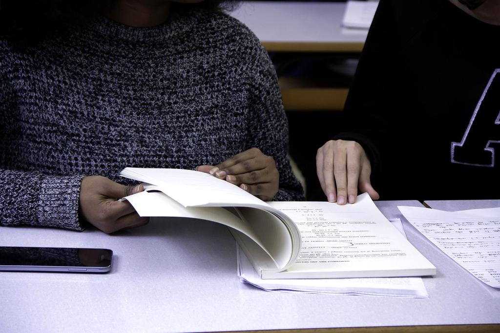 Diverse group of people collaborating in modern learning environment