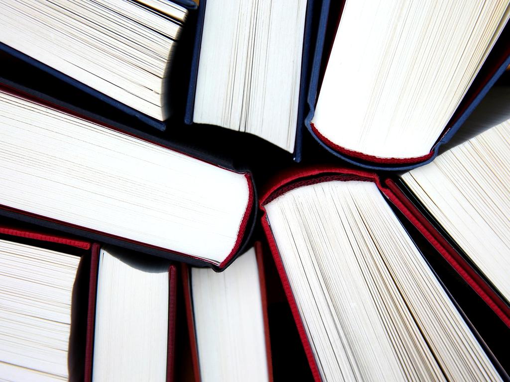 Open book with research notes highlighting evidence base